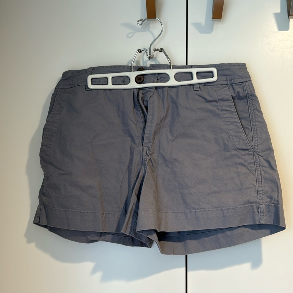 Grey/blue shorts.